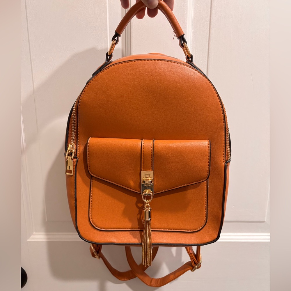 Faux leather backpack/crossbody bag